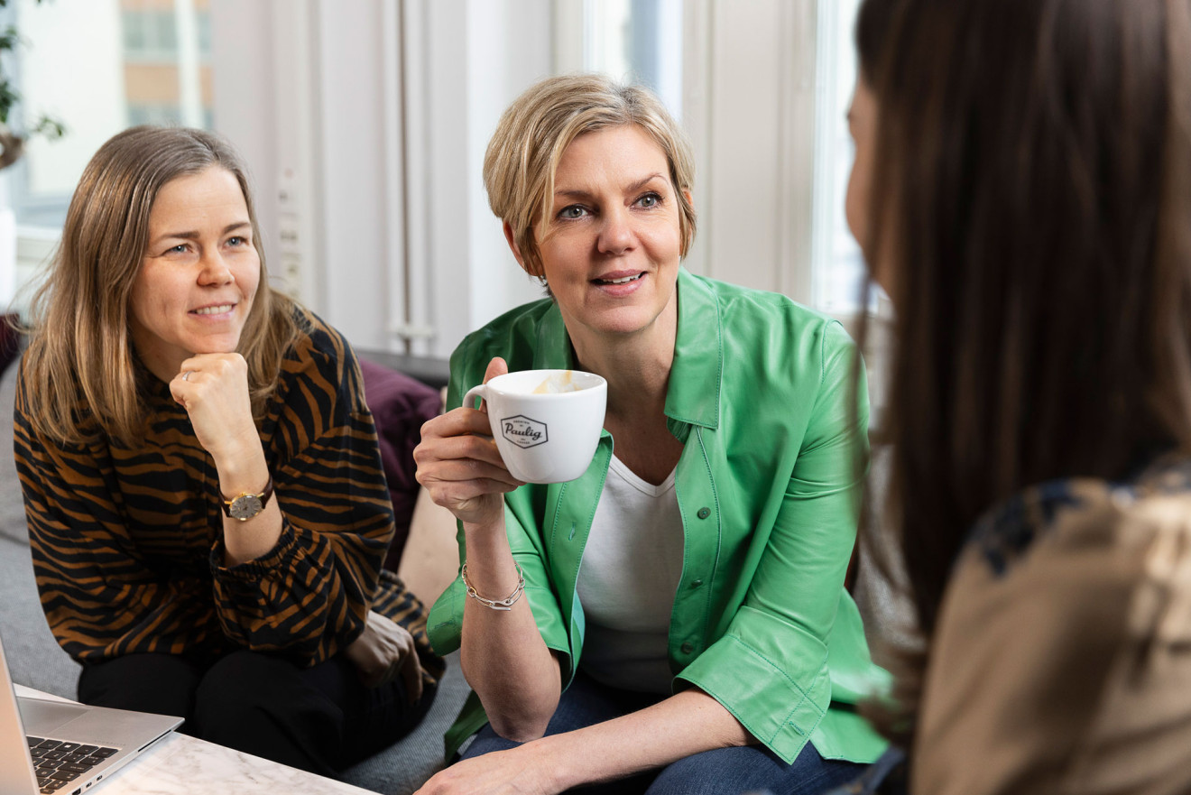 People talking over coffee
