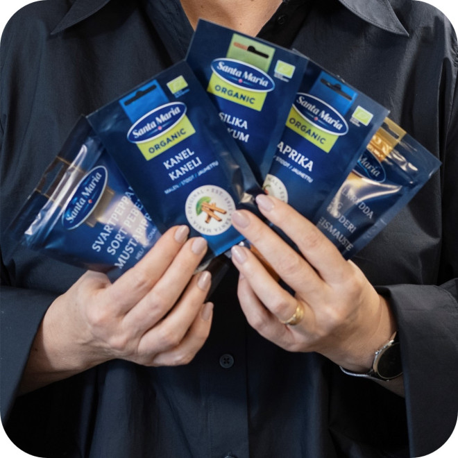 Woman holding spice bags